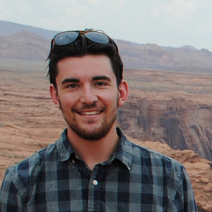 grant standing in front of the Grand Canyon